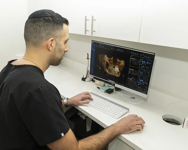 Dr. Justin Bral Planning Dental Implant Procedure