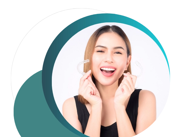 Woman Smiling With Invisalign Trays